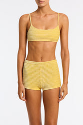 Celeste Maca Triangl Yellow Textured Velvet Shorts